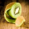 A partially peeled kiwi.