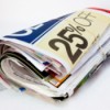 The weekly ad section of a Sunday newspaper.
