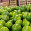 Pile of limes at a store.