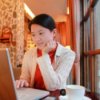 Young woman using computer