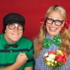 A man and woman in nerd costumes.