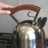 Feng Shui Home Tips for Attracting Wealth, Hand on Water Kettle
