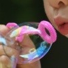 A child blowing bubbles
