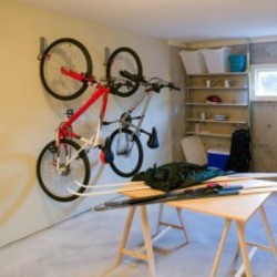 Hanging bicycles on the wall.