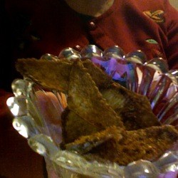 Glass bowl of sweet potato crisps