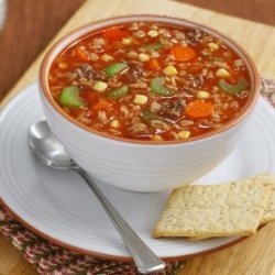A bowl filled with vegetable beef soup.