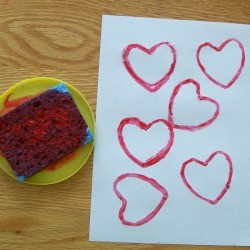 Red inked sponge and stamped paper.