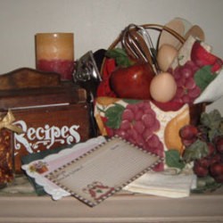 Planning A Kitchen Shower - gift basket with lots of kitchen tools and recipes