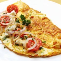 Photo of a egg and cheese omelette.