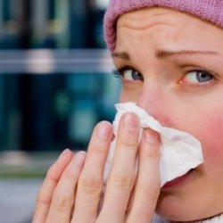 Woman Blowing Her Nose