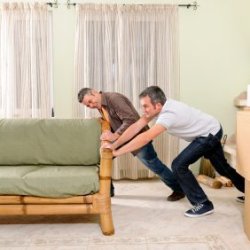 Two Men Moving Sofa