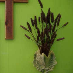 Upcycled McCoy Pottery as a wall pocket.