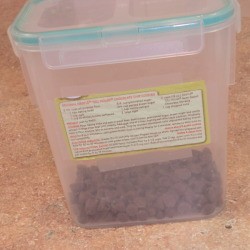 Cookie recipe taped to outside of plastic storage container.