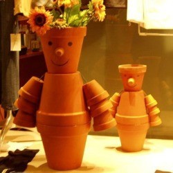 Flower Pot People made from clay pots.