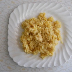 Curried chicken and rice on plate