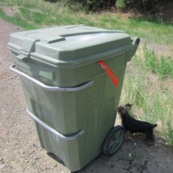 Trash can with pull tie showing.