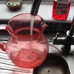 Save lukewarm water from hot water tap.