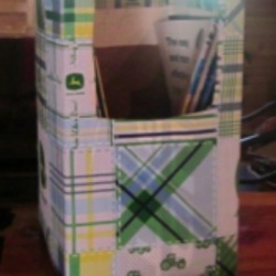 A completed magazine holder from a recycled box.