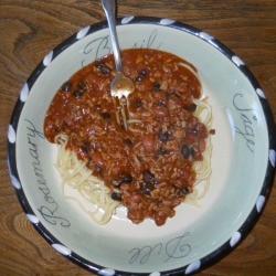 Chili over spaghetti.