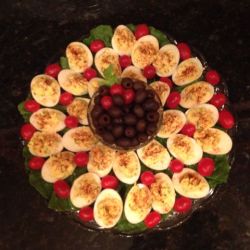 A nicely displayed plate of deviled eggs.