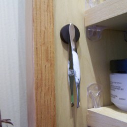 Attach a magnet to store tweezers