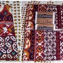 A fabric wallet for storing tea bags.