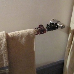 Hair clips on towel bar.