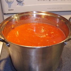 A pot of tomato sauce being cooked.
