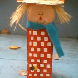 Scarecrow made from patio pavers.