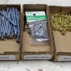 Homemade boxes for organizing small parts.