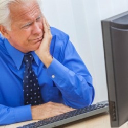 A man having trouble with his computer.