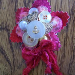 Button pin with red background.