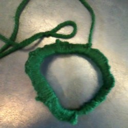 Six pack and yarn cat toy.