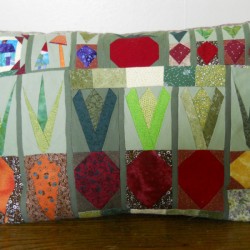 Vegetable garden motif pillow cover.