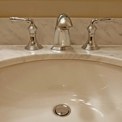 A porcelain sink in a bathroom.