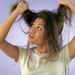 A woman with tangled hair.