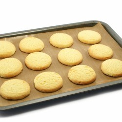 Shortbread cookies on a cookie sheet.