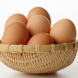 A wicker bowl of eggs.