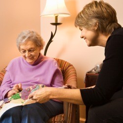 Elderly Woman doing needle work