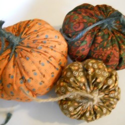 Three yo yo pumpkins.