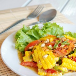 Lettuce, tomato and corn salad.