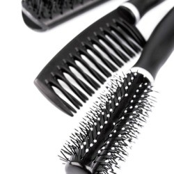 Two hair brushes and a comb.
