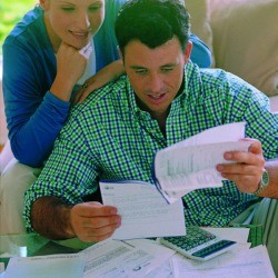 A couple working on their household budget.