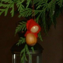 Red Riding Hood ornament on tree.