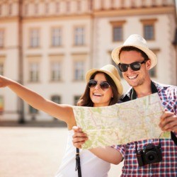A man and a woman enjoying being tourists.