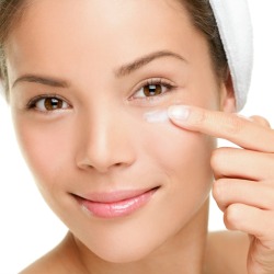Applying Skin So Soft Under Eyes