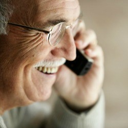 Man Using Telephone