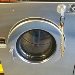 front load washer with bungee cord keeping it open