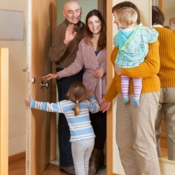 family arriving at grandmother's house