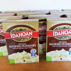 Boxes of potatoes bought on sale.